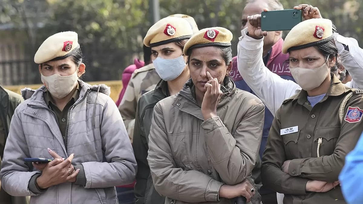 Delhi Police personnel guard