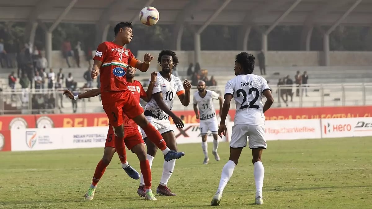 Players from Sudeva Delhi and Mohammedan Sporting contest for the ball.