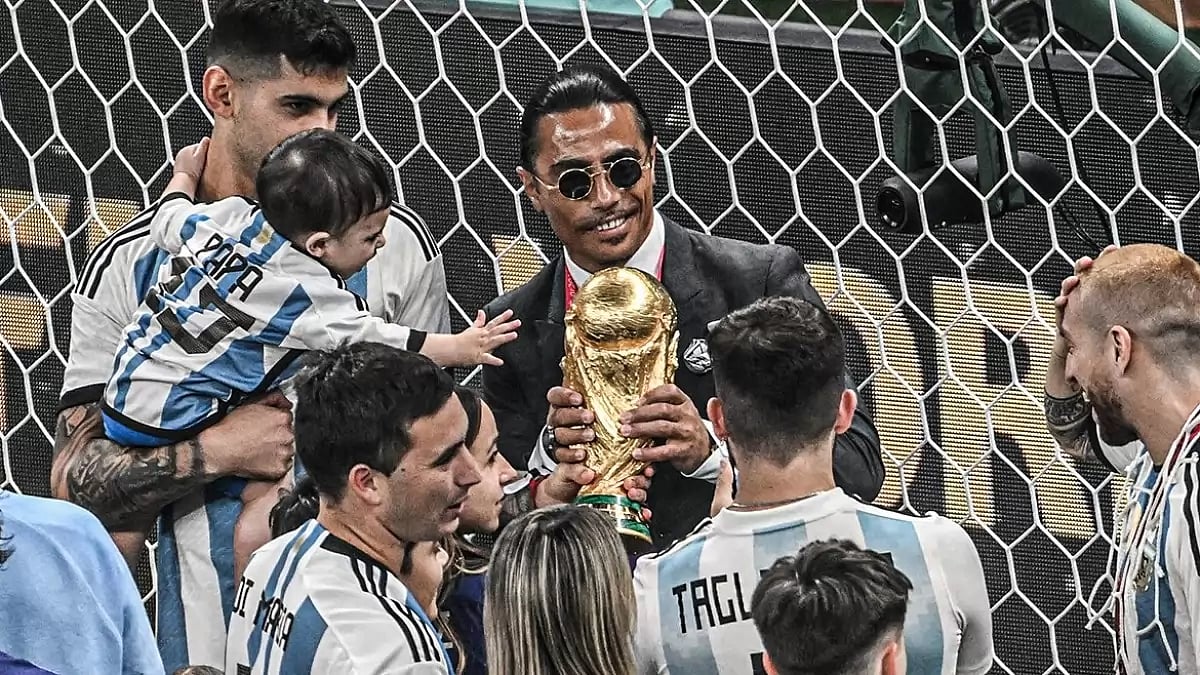 Gokce, centre, was a regular guest of FIFA with VIP access during the World Cup.