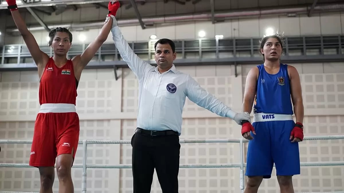 The referee raises Lovlina's hands she is declared as the winner.