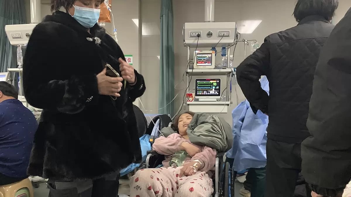 A patient rests in a wheelchair at the emergency department of the Langfang No. 4 Peoples Hospital in Bazhou city in northern Chinas Hebei province.