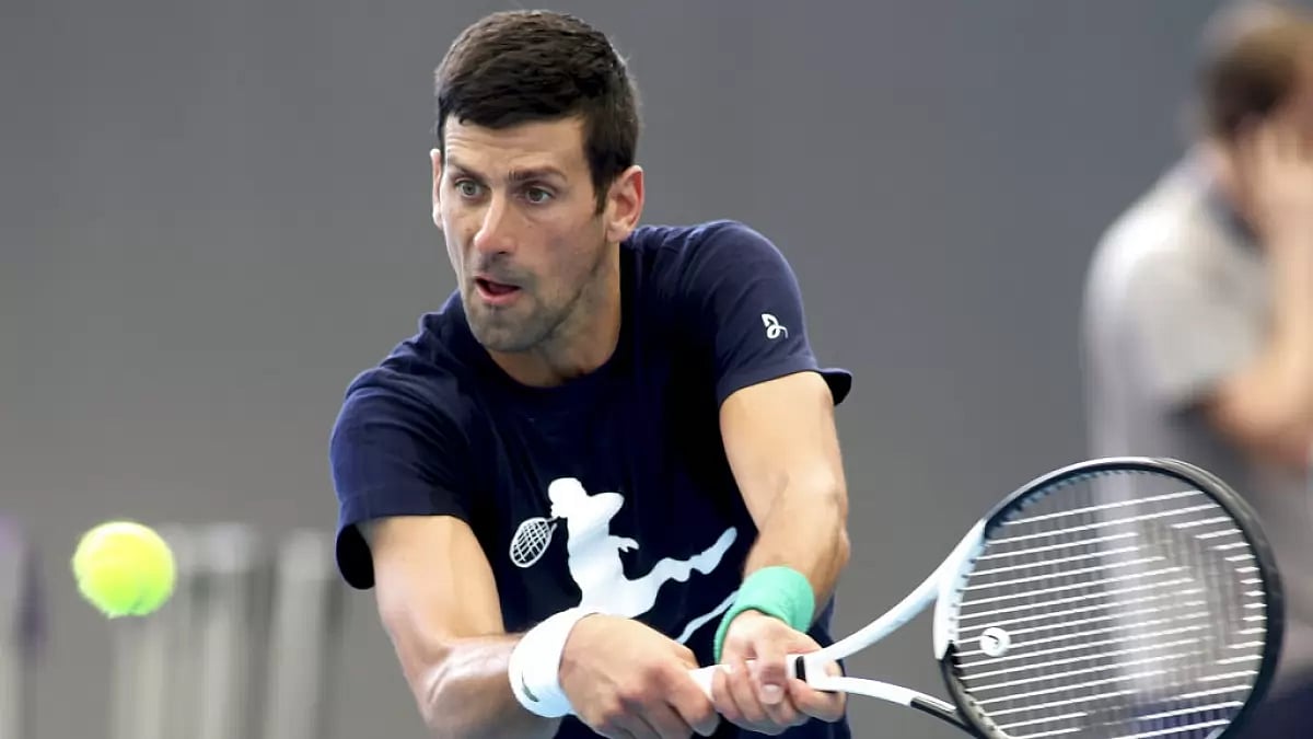 Djokovic plays a backhand during a practice session ahead of the Adelaide International.