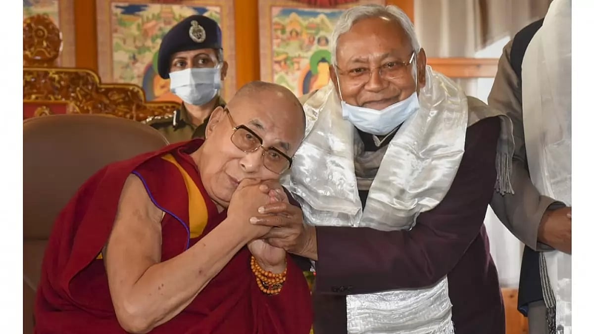 Dalai Lama with Nithsh Kumar