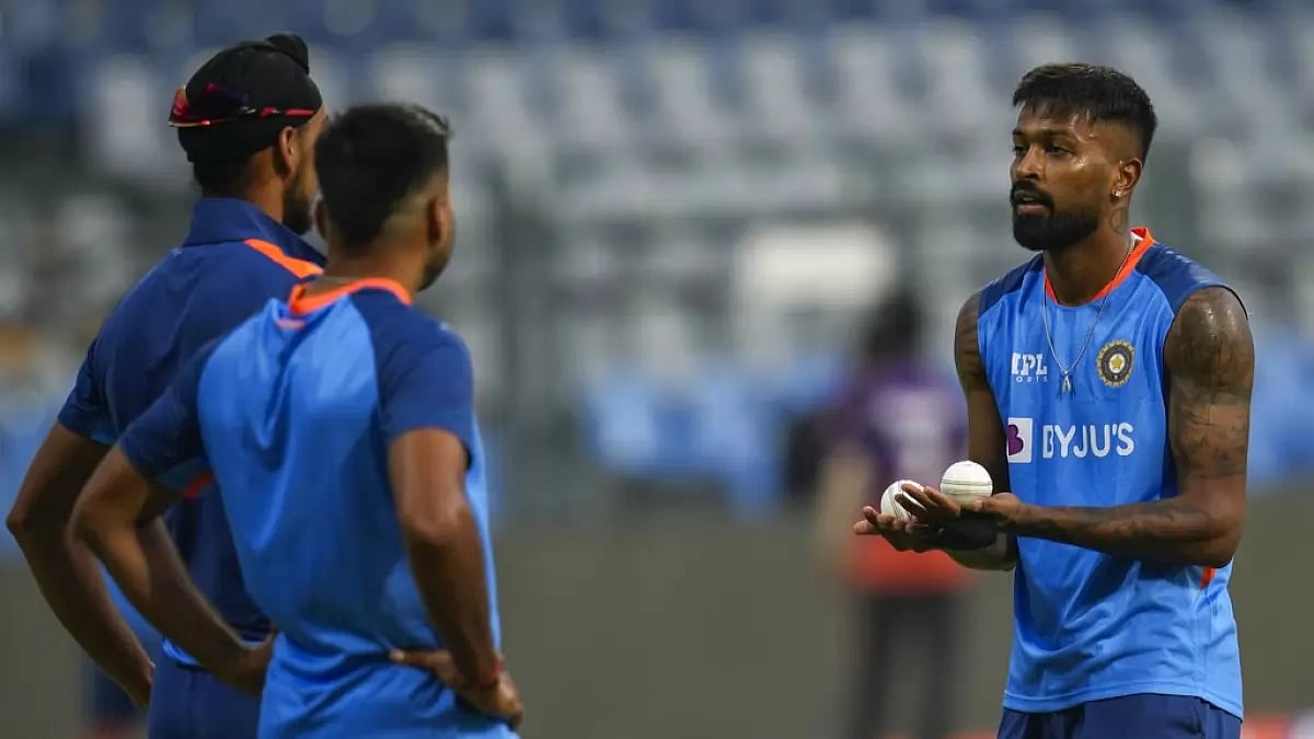 Hardik Pandya, right, interacts with team mates.