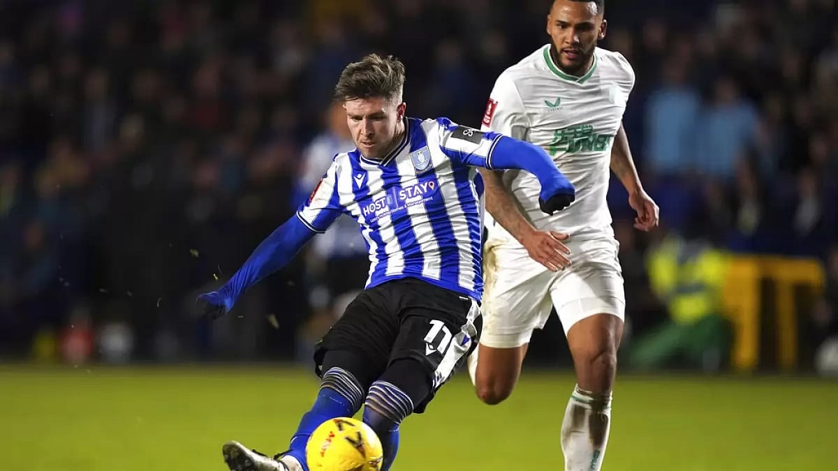 Josh Windass of Sheffield Wednesday scores a goal against Newcastle in the FA Cup on Saturday.