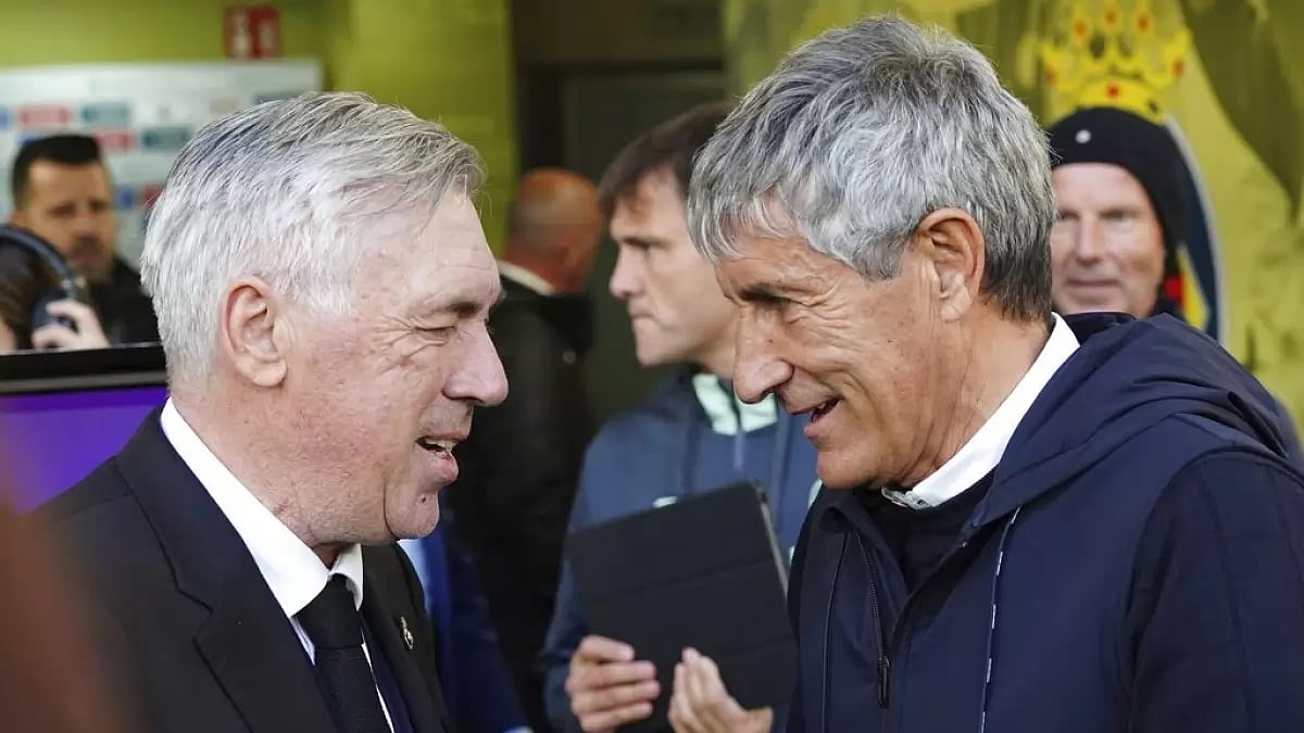 Quique Setien, right, greets Carlo Ancelotti ahead of Villareal vs Real Madrid match on Saturday.