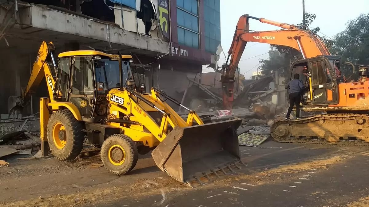 Bulldozers demolishing the coaching centre of the accused in Jaipur, Rajasthan