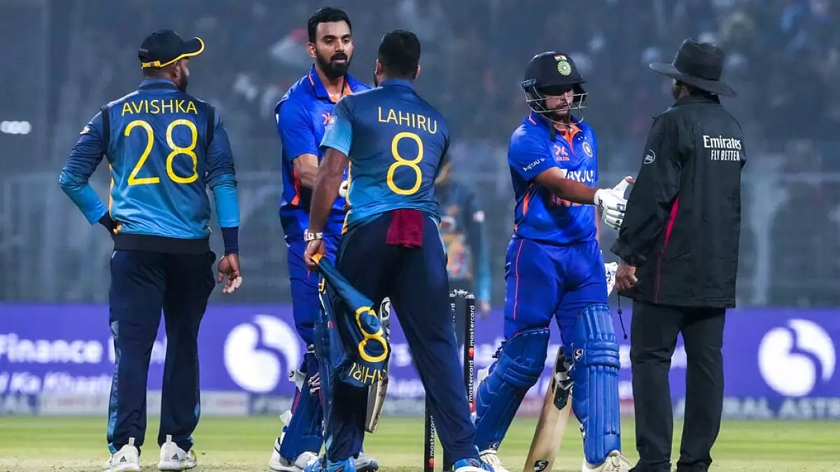 Rahul and Kuldeep shake hands with players and officials after India's win on Thursday.