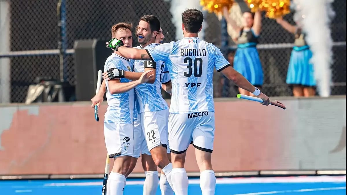 Casella Maico, left, celebrates with teammates after scoring a goal against SA on Friday.