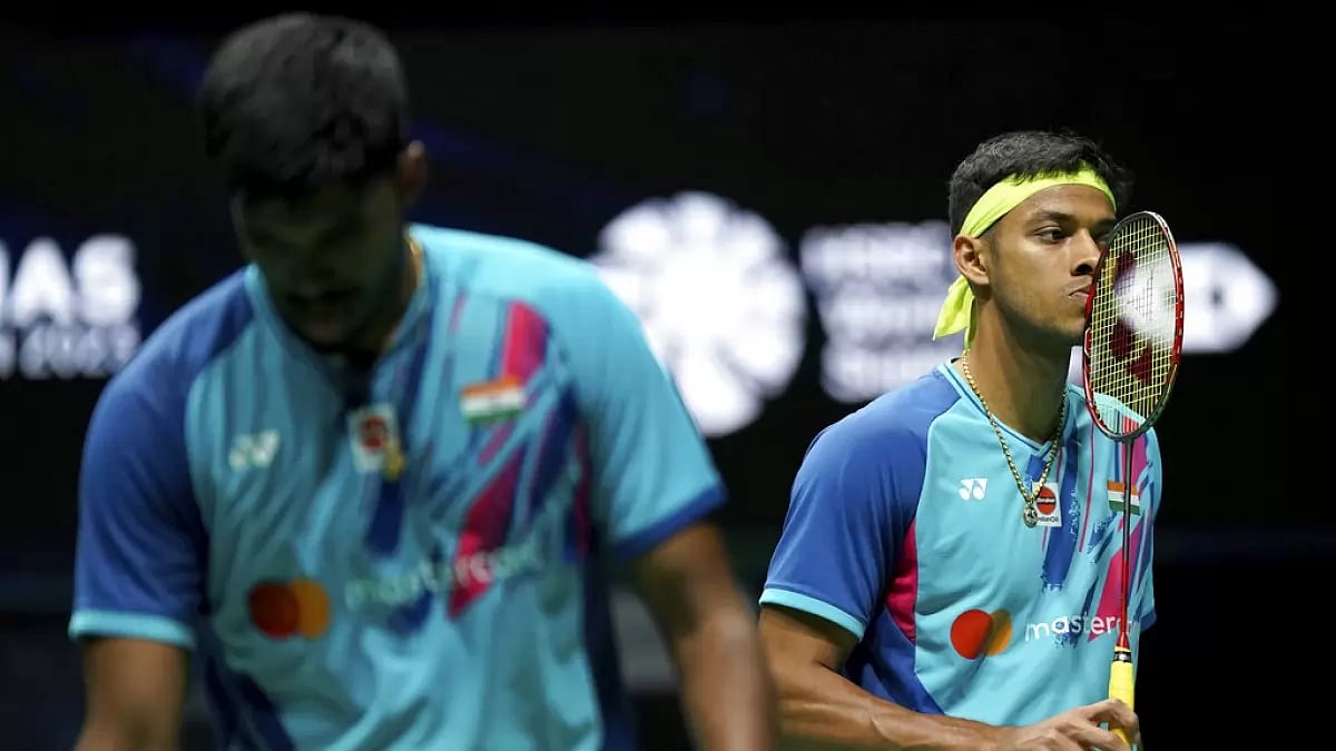 Satwik, left, and Chirag react during their Malaysia Open semifinal match on Saturday.