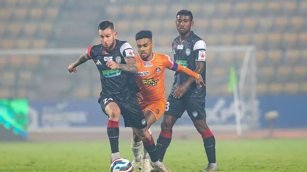 FC Goa and NEUFC players in action on Sunday.