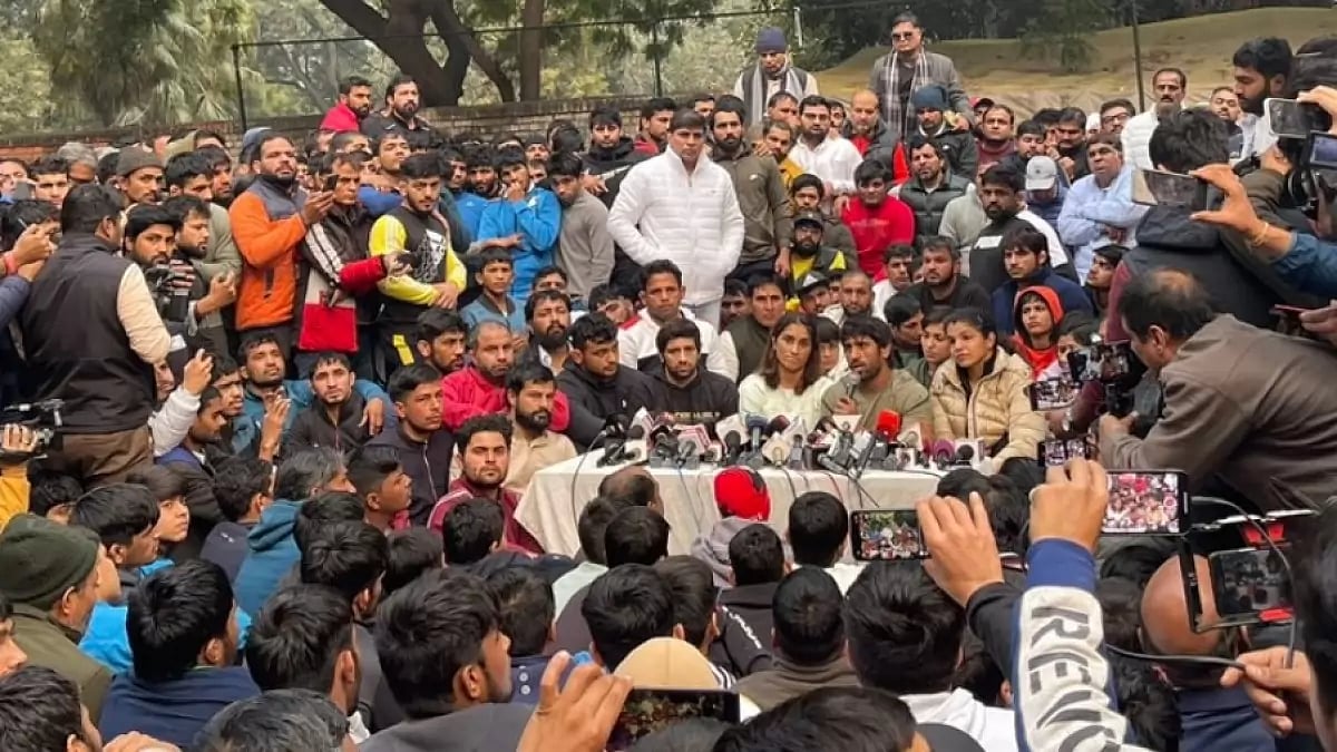 Protesting wrestlers speak to the media at Jantar Mantar on Thursday.
