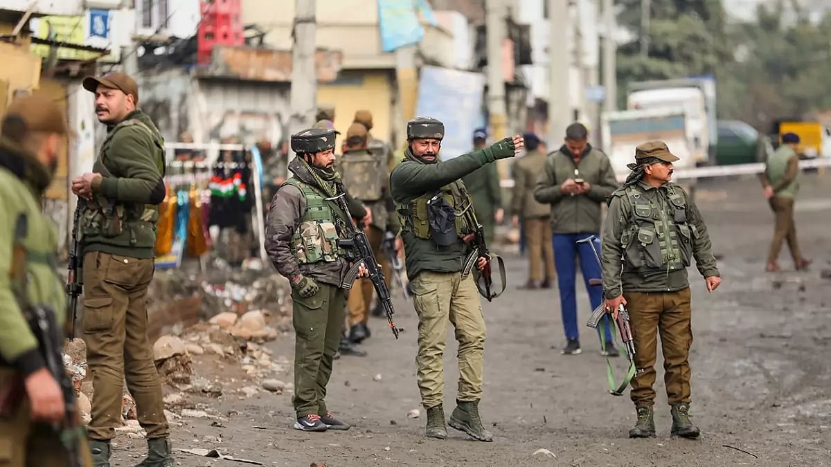Security forces personnel near the site of blast in Jammu's Narwal