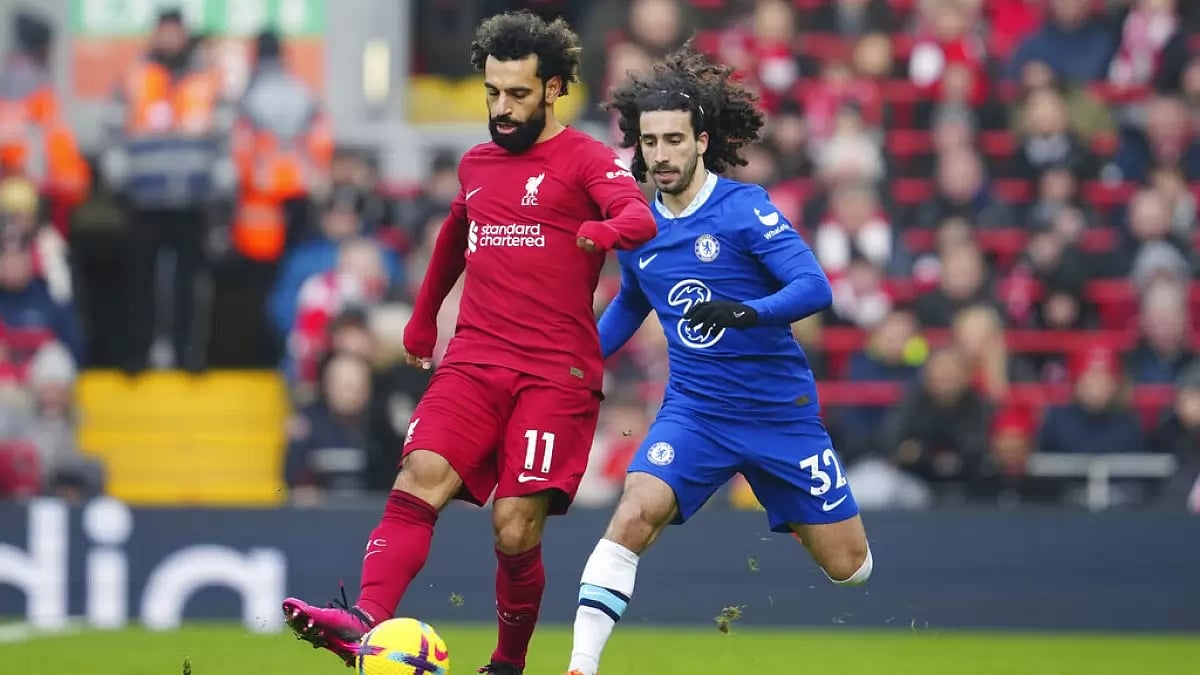 Mohamed Salah controls the ball against Chelsea's Marc Cucurella during their EPL match on Saturday.