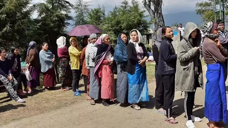 People at a polling booth - Representative Image