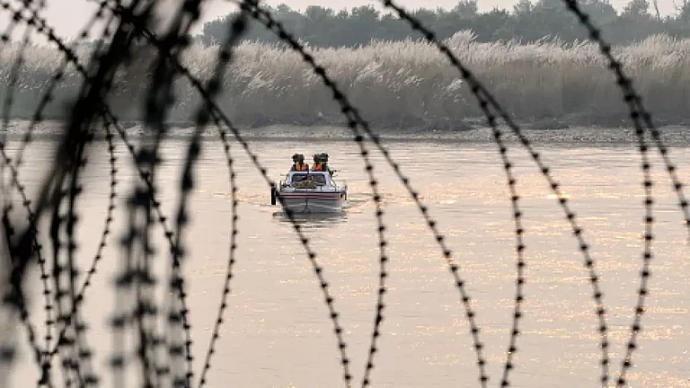 Security personnel patrolling in Chenab river, a tributary of river Indus - null