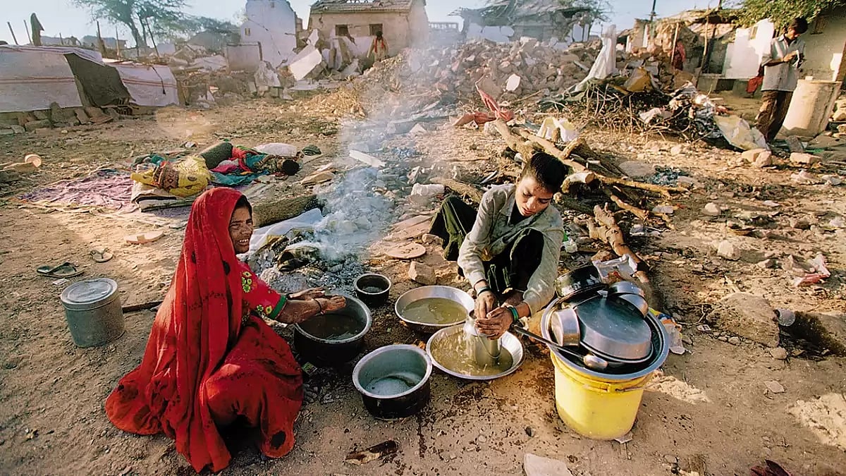 Ground Zero: Women cook amidst the rubble of the 2001 earthquake in Bhuj, Gujarat.