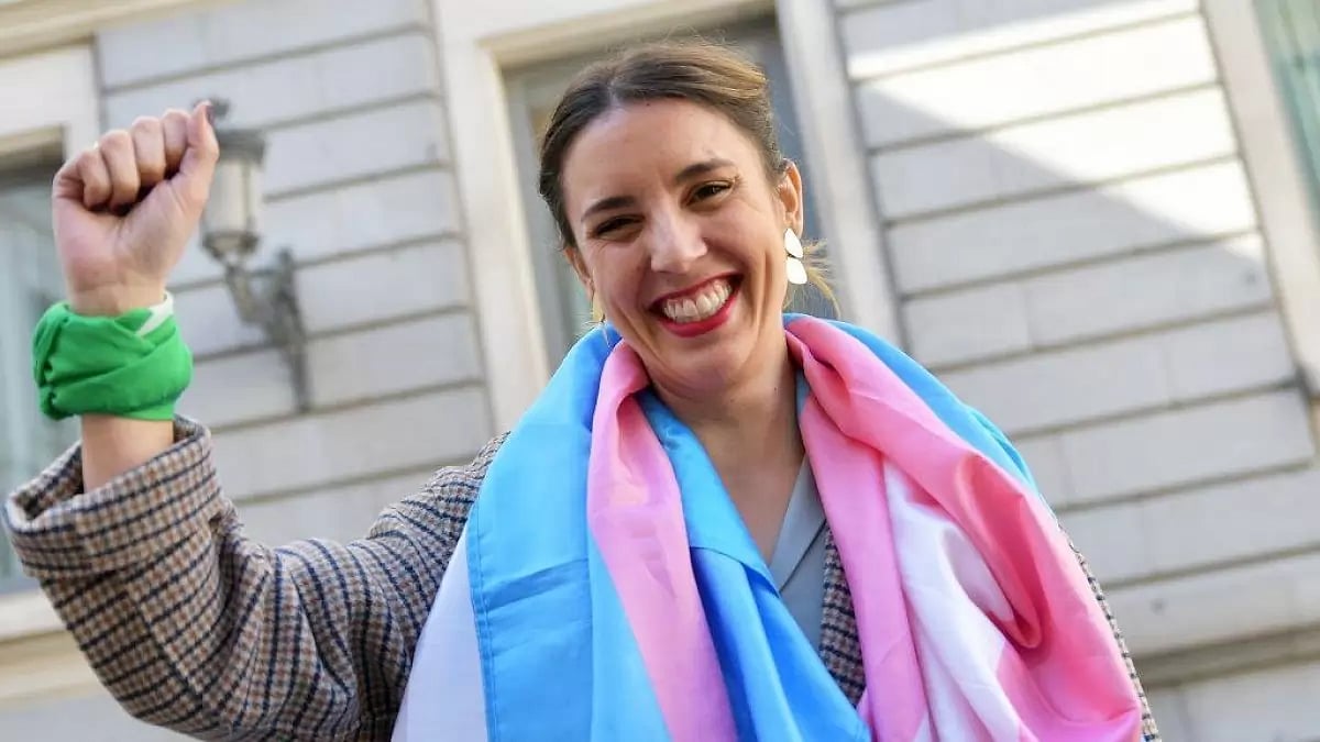 Spain's Equality Minister celebrating after the vote