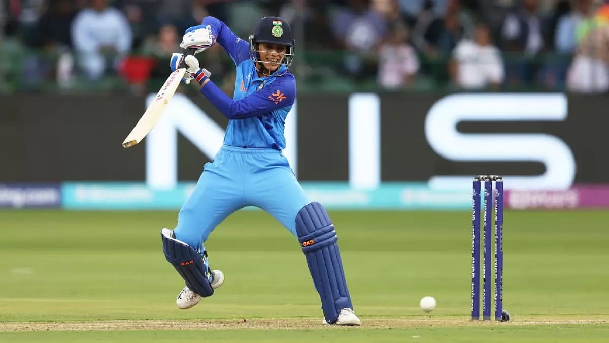 Mandhana plays a shot en route to her 41-ball 52 against England on Saturday.