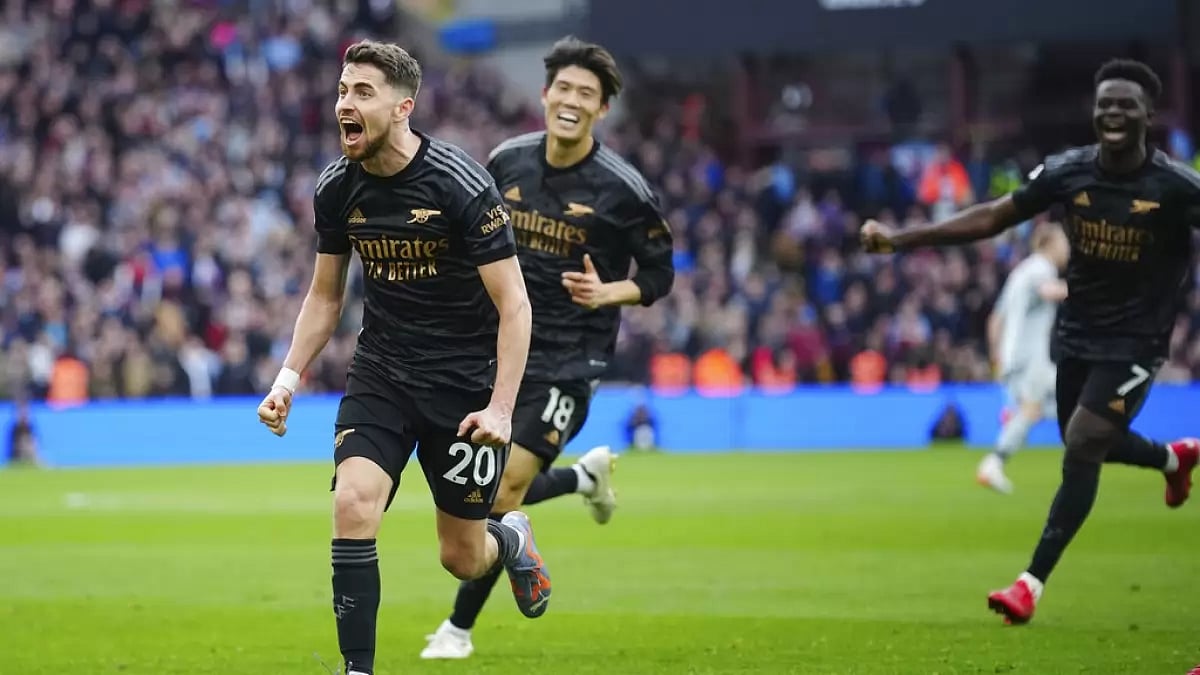 Jorginho, left, celebrates after scoring a goal against Aston Villa on Saturday.