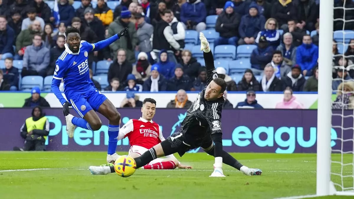 Arsenal's Gabriel Martinelli, centre, scores past Leicester's goalkeeper Danny Ward on Saturday.