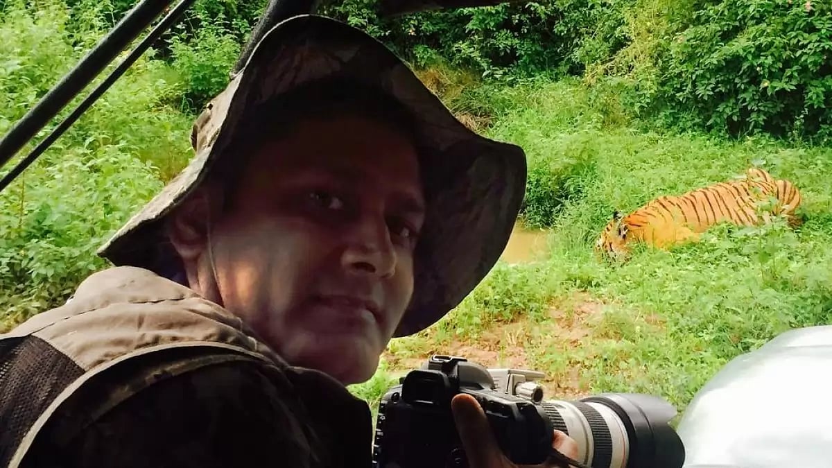 Kumble captures a tiger, indulging in a passion he developed while on tours in his playing days.