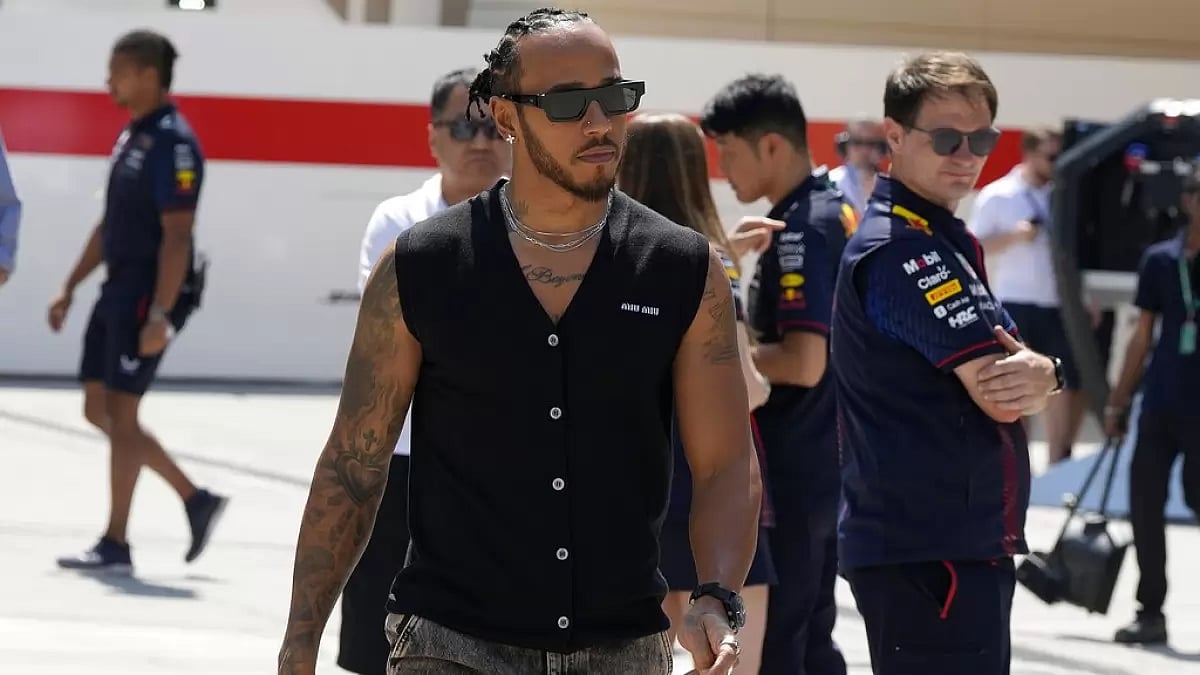 Hamilton arrives at the Bahrain International Circuit for free practice on Friday.