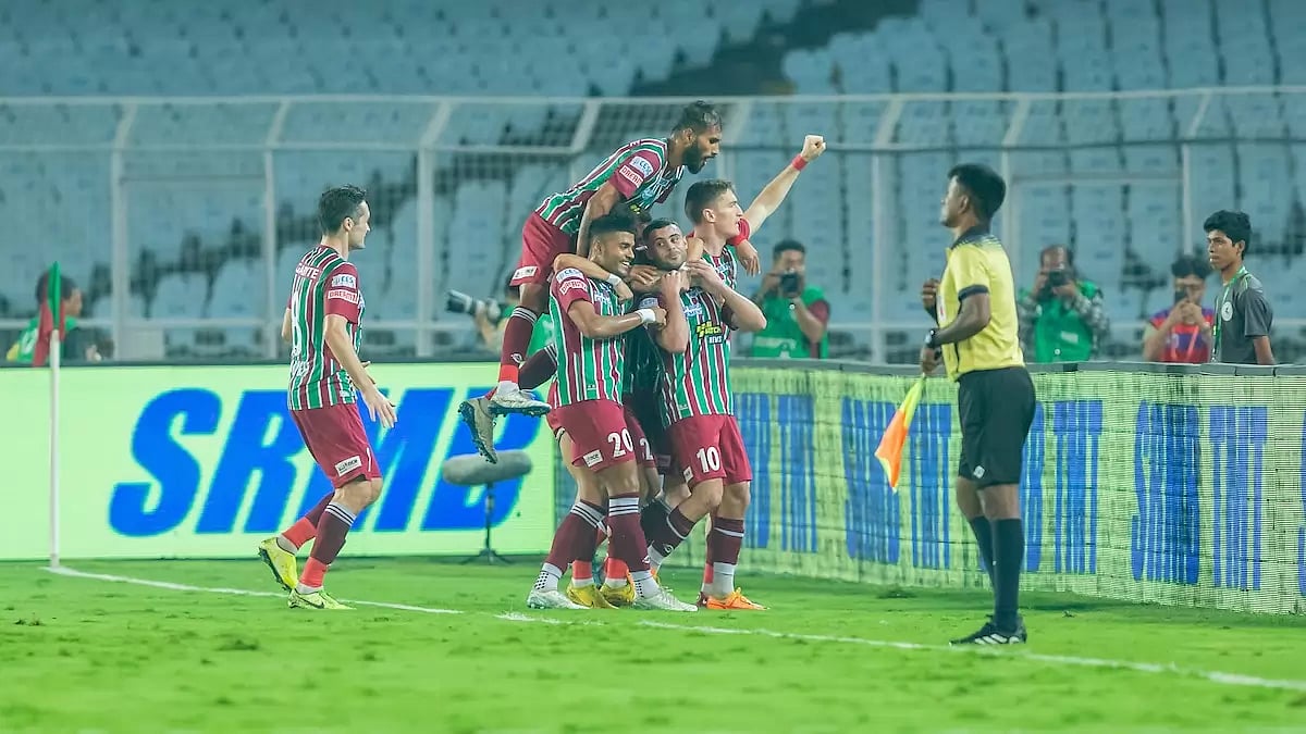 ATKMB players celebrate Hugo Boumous' goal against OFC on Saturday.