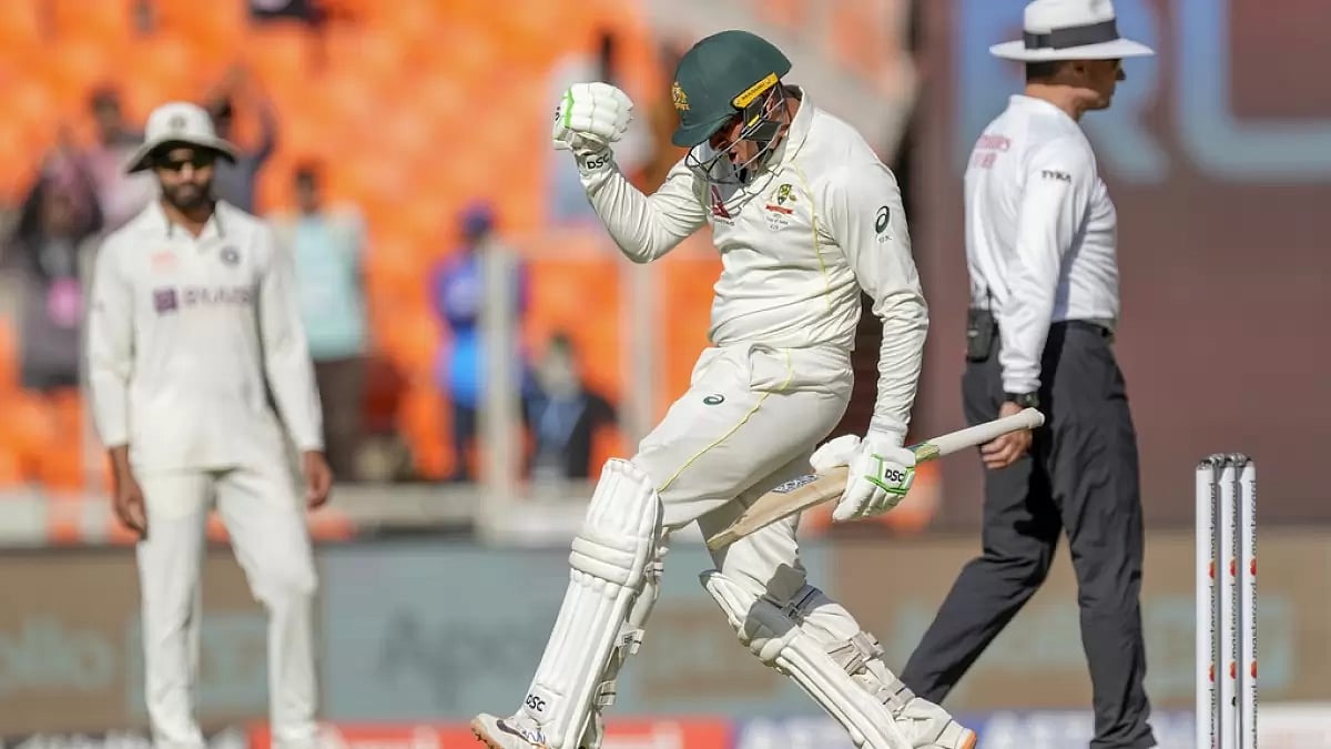 Khawaja celebrates after reaching his century on Day 1 of the 4th Test on Thursday.