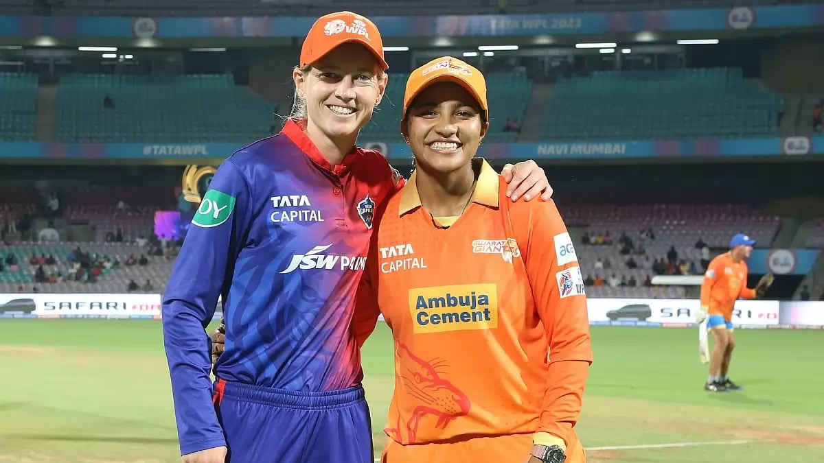 Captains Meg Lanning and Sneh Rana pose for a picture ahead of their teams' match on Saturday.