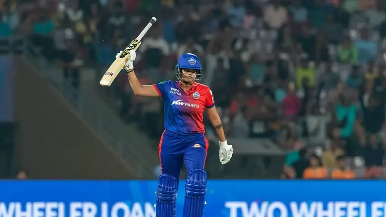 Shafali Verma celebrates after reaching her half-century against Gujarat Giants on Friday. - null