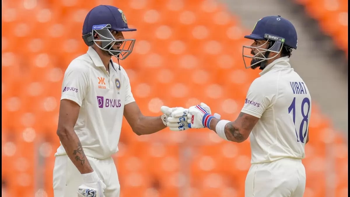 Axar Patel, left, forged a 162-run partnership with Kohli for the sixth wicket.