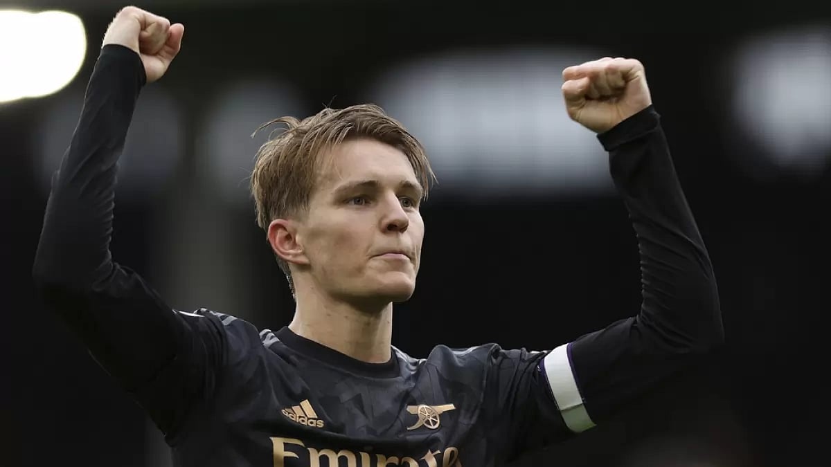 Martin Odegaard celebrates after the final whistle against Fulham on Sunday.