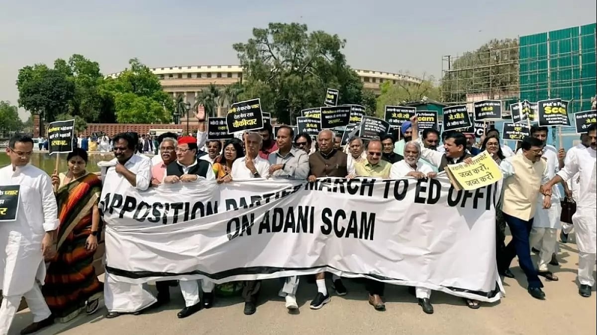 Opposition takes out rally to protest Adani row