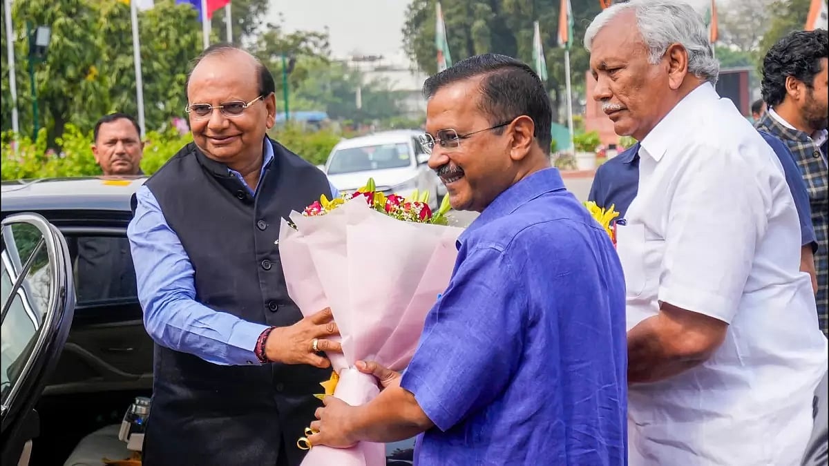 Delhi LG VK Saxena being welcomed by Chief Minister Arvind Kejriwal and Speaker Ram Niwas Goel as he
