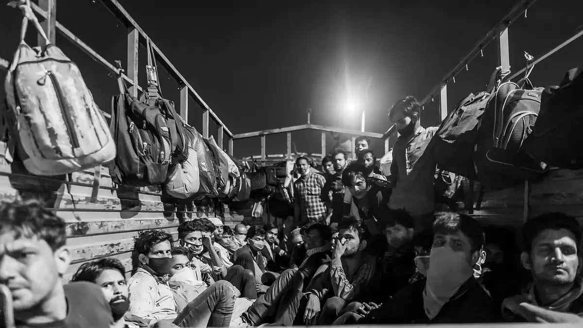 Migrant labourers on their journey back home in 2020