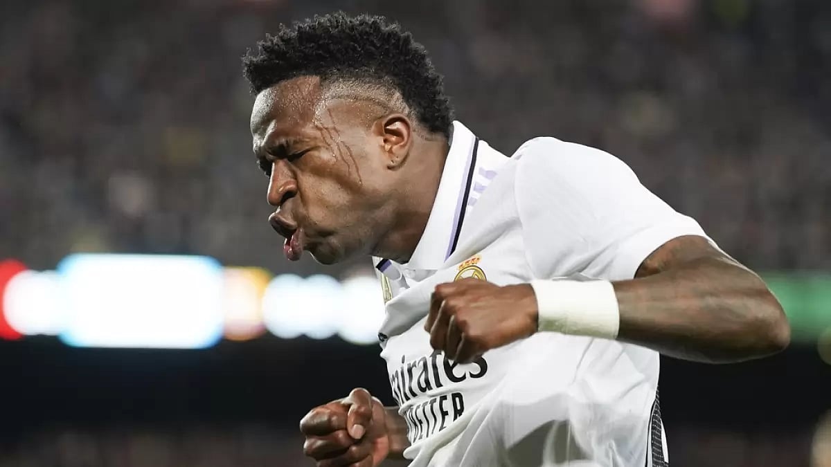 Vinicius Jr celebrates his team's first goal against Barcelona on Sunday.