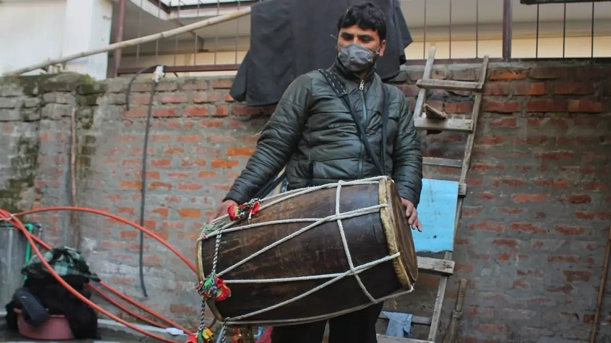 Seher Khan, a traditional drummer in Kashmir Valley