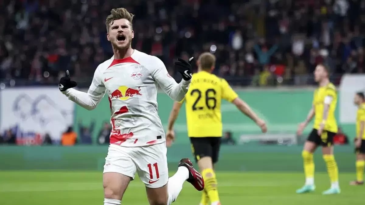 Leipzig's Timo Werner, left, celebrates after scoring against Dortmund.