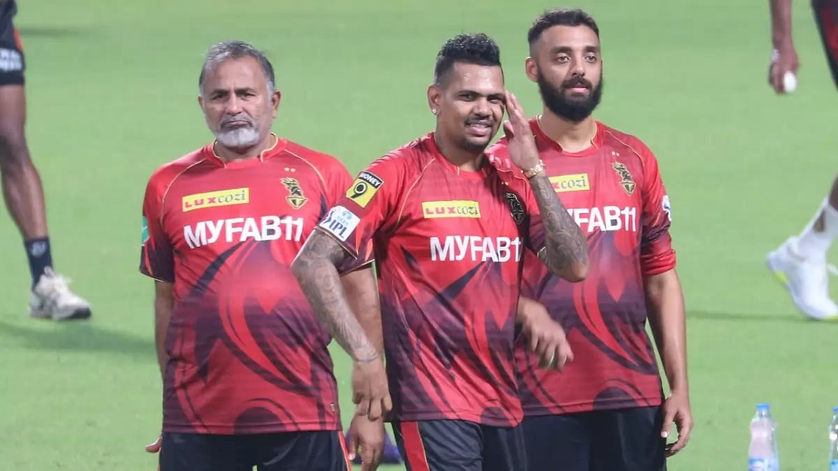File : Bharat Arun, left, with Narine and Chakravarthy during a KKR practice session.