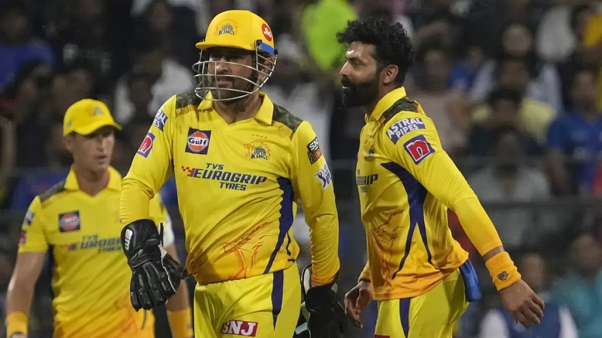 Jadeja celebrates the wicket of Tilak Varma with Dhoni in Mumbai on Saturday.