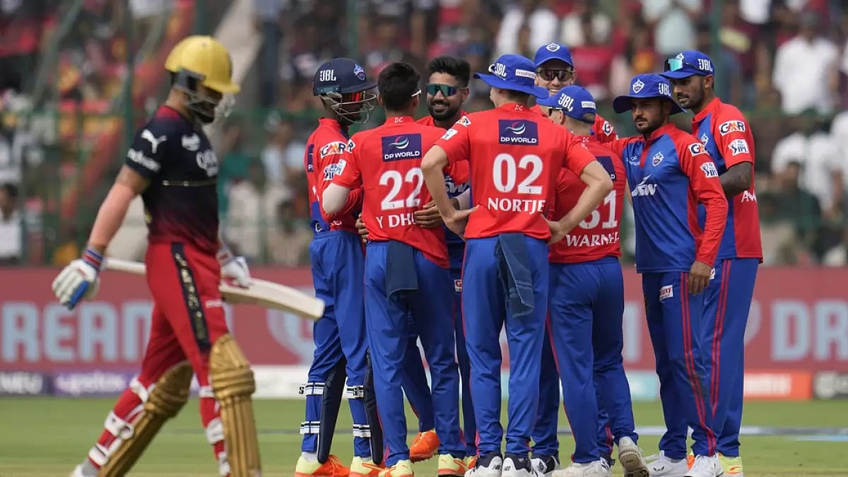 DC bowlers celebrate the wicket of Virat Kohli in Bengaluru on Saturday.