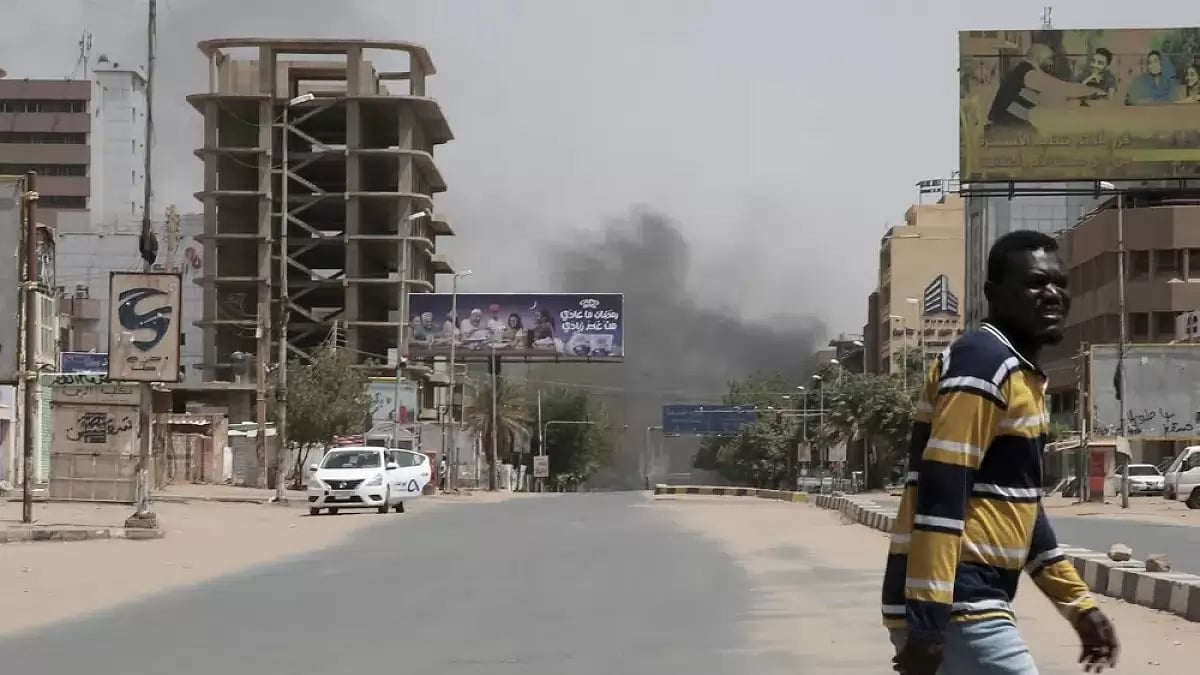 Smoke is seen rising from a neighborhood in Khartoum, Sudan.