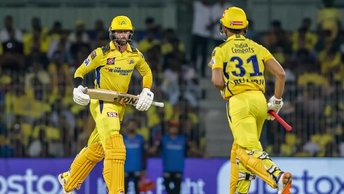 Conway, left, and Gaikwad put on an 87-run opening wicket stand on Friday.