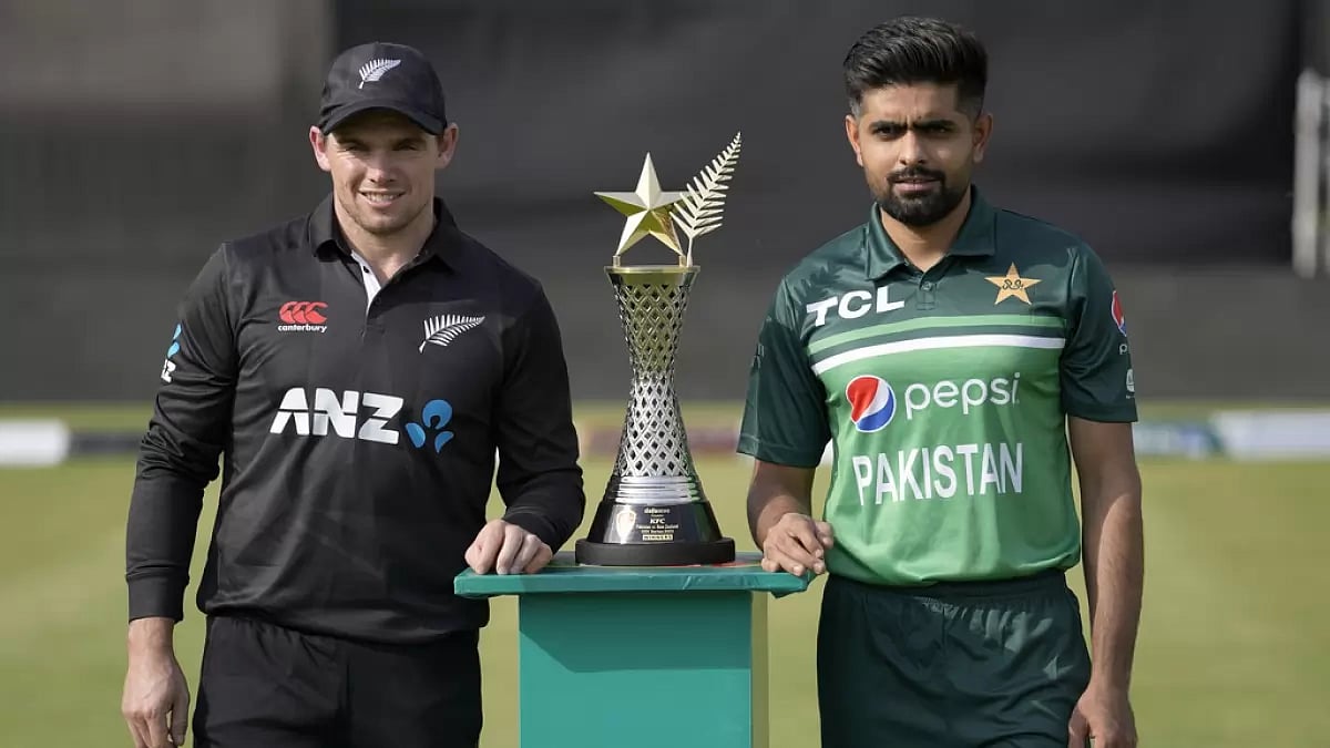 Tom Latham and Babar Azam pose with the ODI series trophy in Rawalpindi on Wednesday.