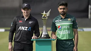 Tom Latham and Babar Azam pose with the ODI series trophy in Rawalpindi on Wednesday.