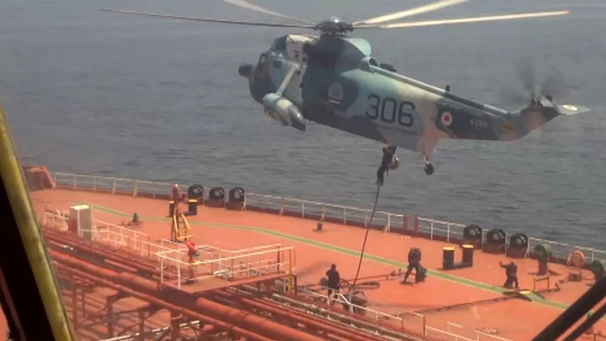 In this screengrab from footage released by Iran, commandos are seen raiding and seizing the oil tanker with 34 Indian crew members.