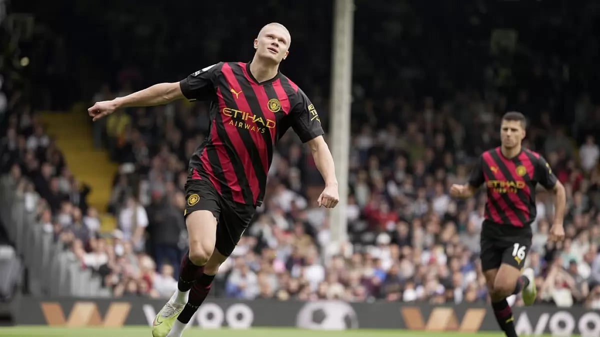 Haaland celebrates after scoring his team's first goal against Fulham on Sunday.