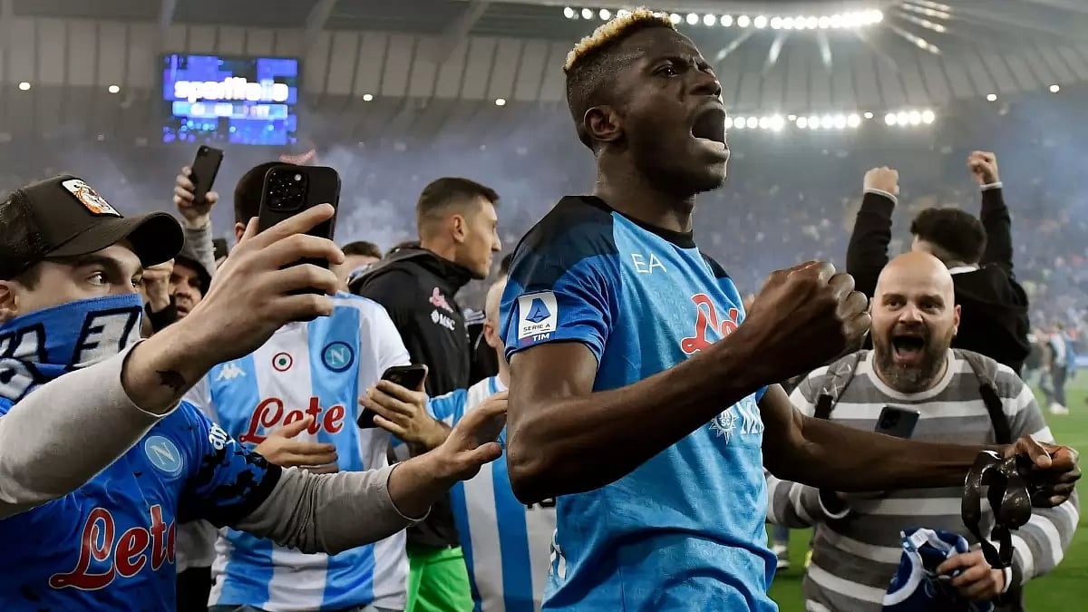 Striker Victor Osimhen celebrates with Napoli fans
