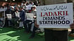 From Jubilation To Dissent: How The View Of Ladakh Changed On Union Territory Status Protestors hold placards during a protest demanding statehood for the Ladakh region on February 15, 2023 in New Delhi, India
